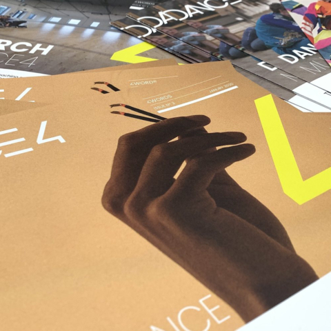 Dance4 brochures laid out on a table.